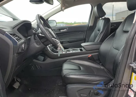 2022 Ford Edge Titanium z USA, uszkodzony, nr VIN 2FMPK4K94NBA13914